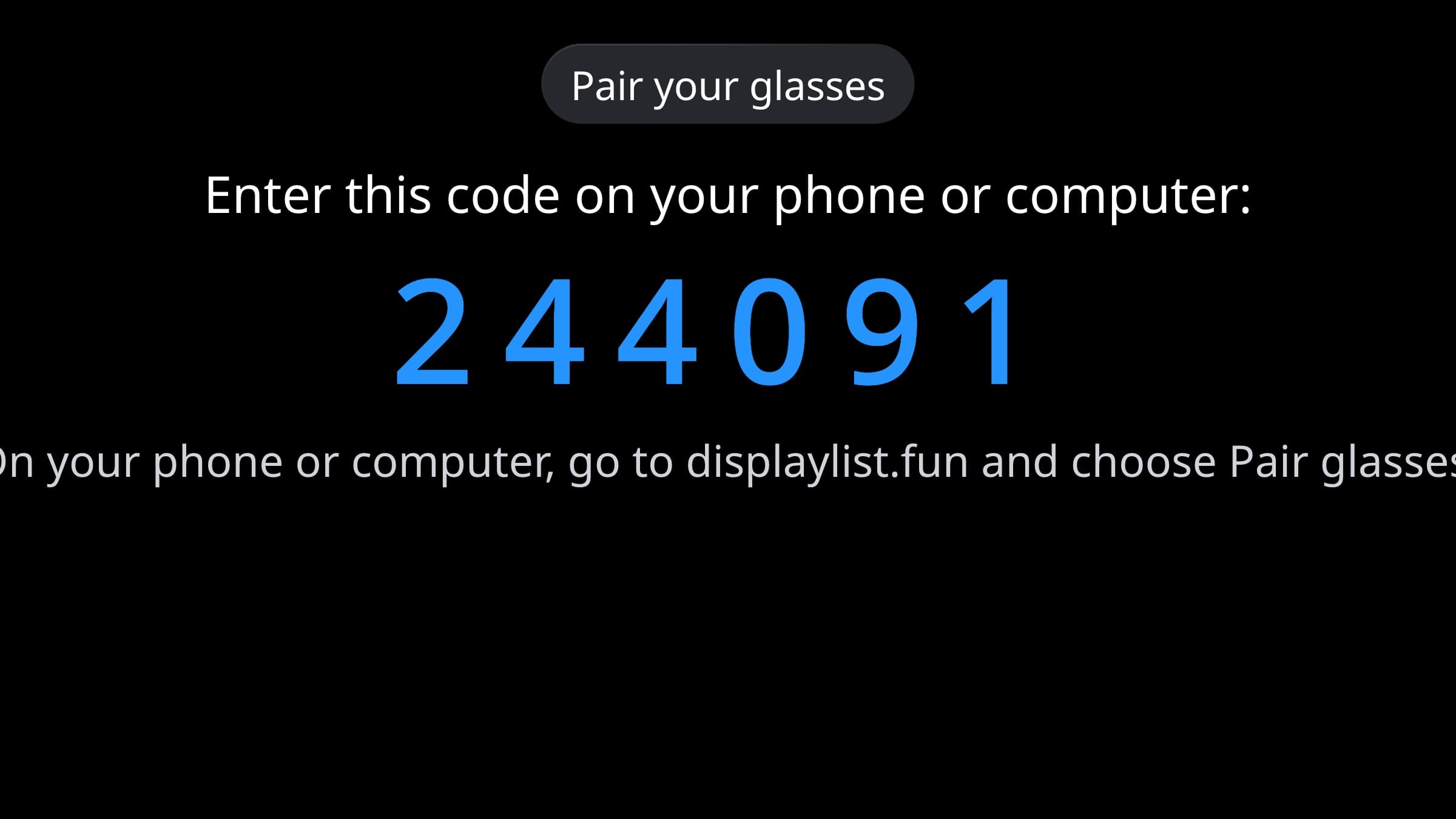 The pairing screen on the glasses: a six digit code in blue under Pair your glasses.